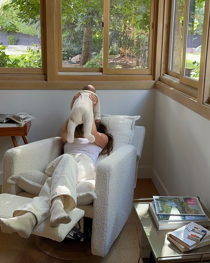 Flynn – Gliding Swivel Nursery Recliner - High Performance Bouclé Oyster