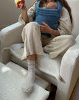 Flynn – Gliding Swivel Nursery Recliner - High Performance Bouclé Oyster