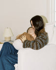 Flynn – Gliding Swivel Nursery Recliner - High Performance Bouclé Oyster