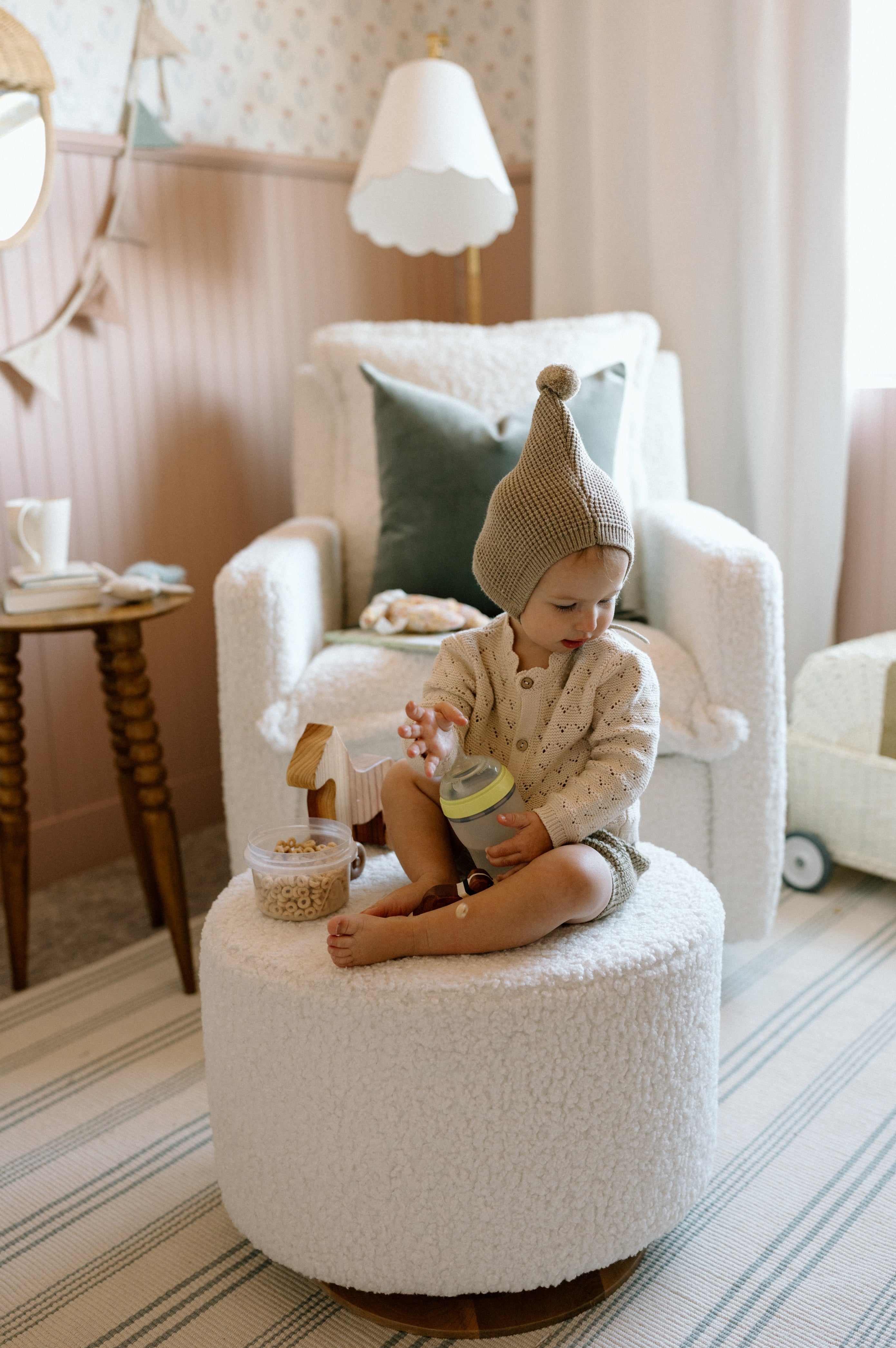 Small Stationary Oval Ottoman With Wood Base