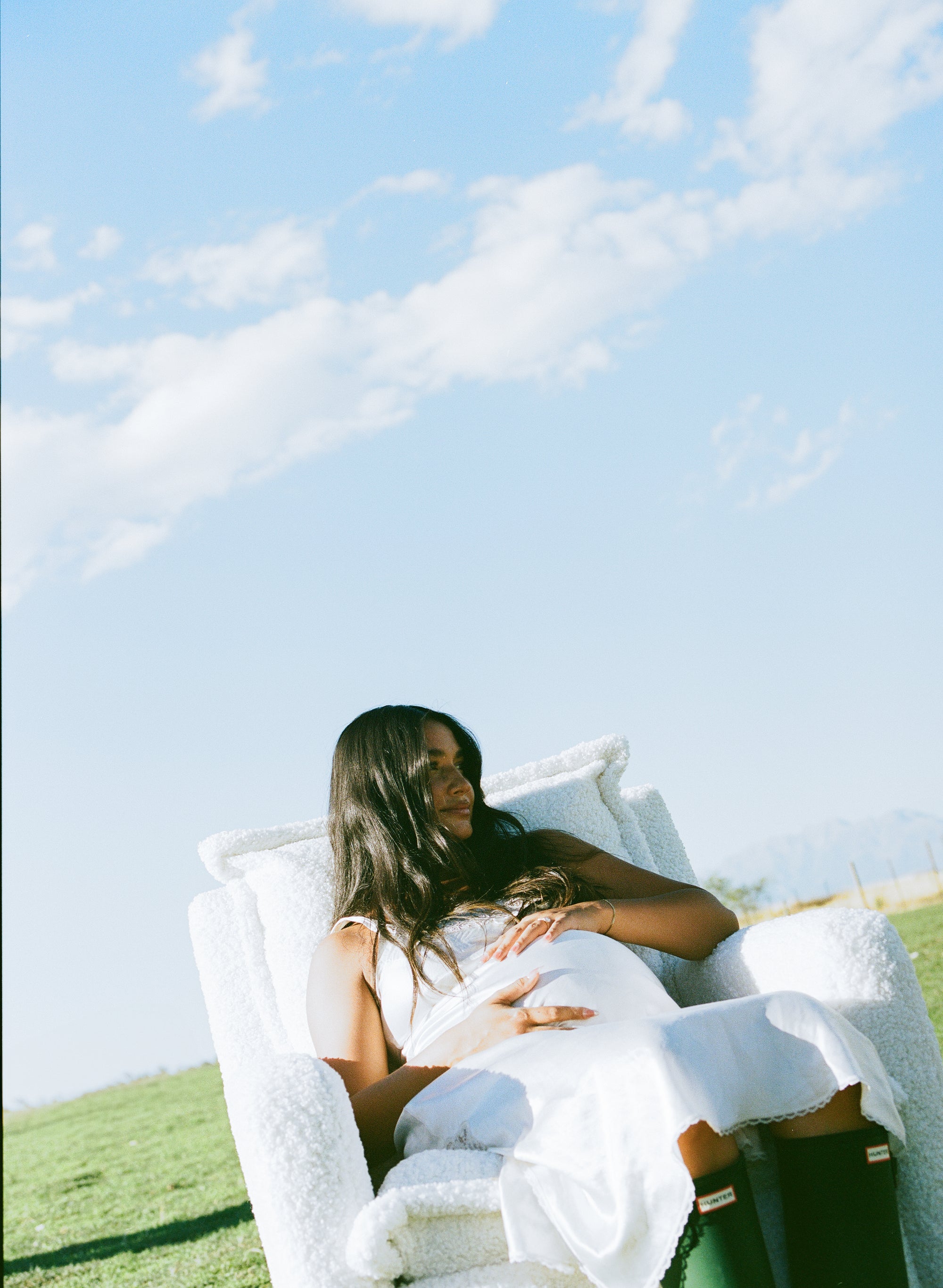 Flynn – Gliding Swivel Nursery Recliner - Sheepskin Cloud