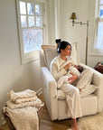 Flynn – Gliding Swivel Nursery Recliner - High Performance Bouclé Oyster
